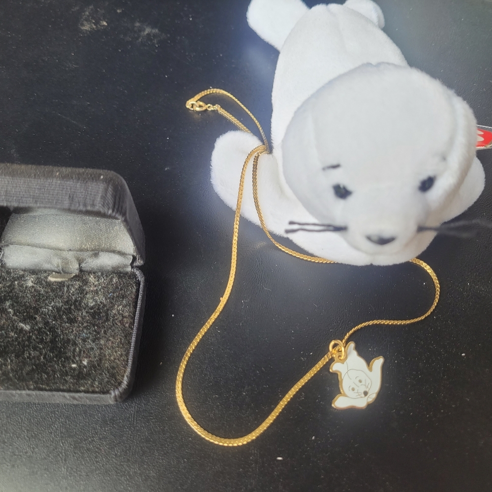 Preowned Seamore the Seal Beanie Baby with a pretty seal necklace.